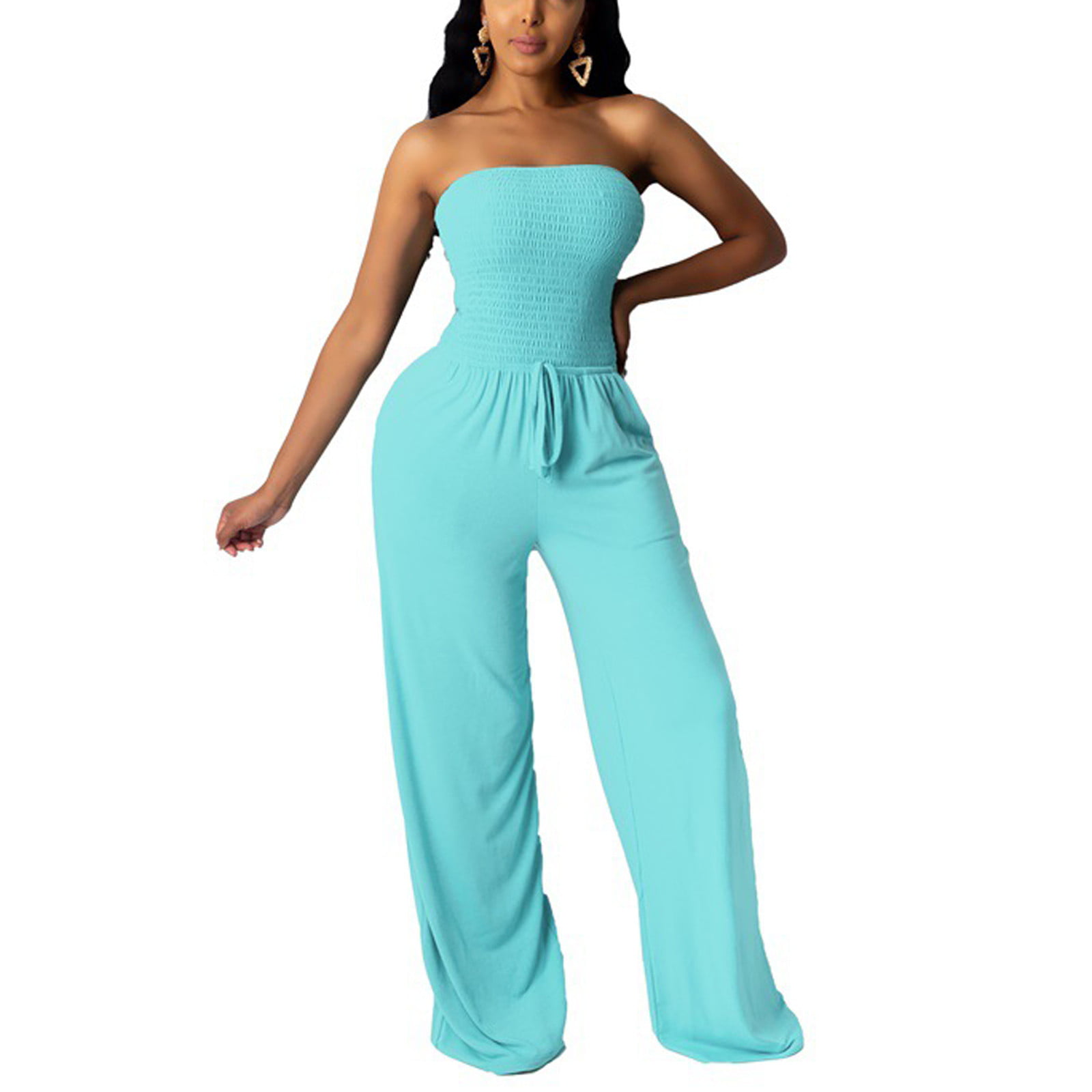 VENUS - Slits up the legs makes this effortless striped jumpsuit feel extra  breezy. Smocked Strapless Jumpsuit: http://bit.ly/2vmqSEa Shop Weekend  Retreat: http://bit.ly/32xNZaR~ | Facebook