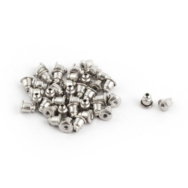 Unique Bargains Ladies Metal Earring Backs Clasps Stoppers Accessory 40pcs in silver tone. The image shows a pile of 40 small, metallic earring back stoppers with a smooth finish, designed for stud earrings. Two stoppers are placed separately for a closer view of their shape and design. Ideal for replacing lost earring backs or crafting new earrings.