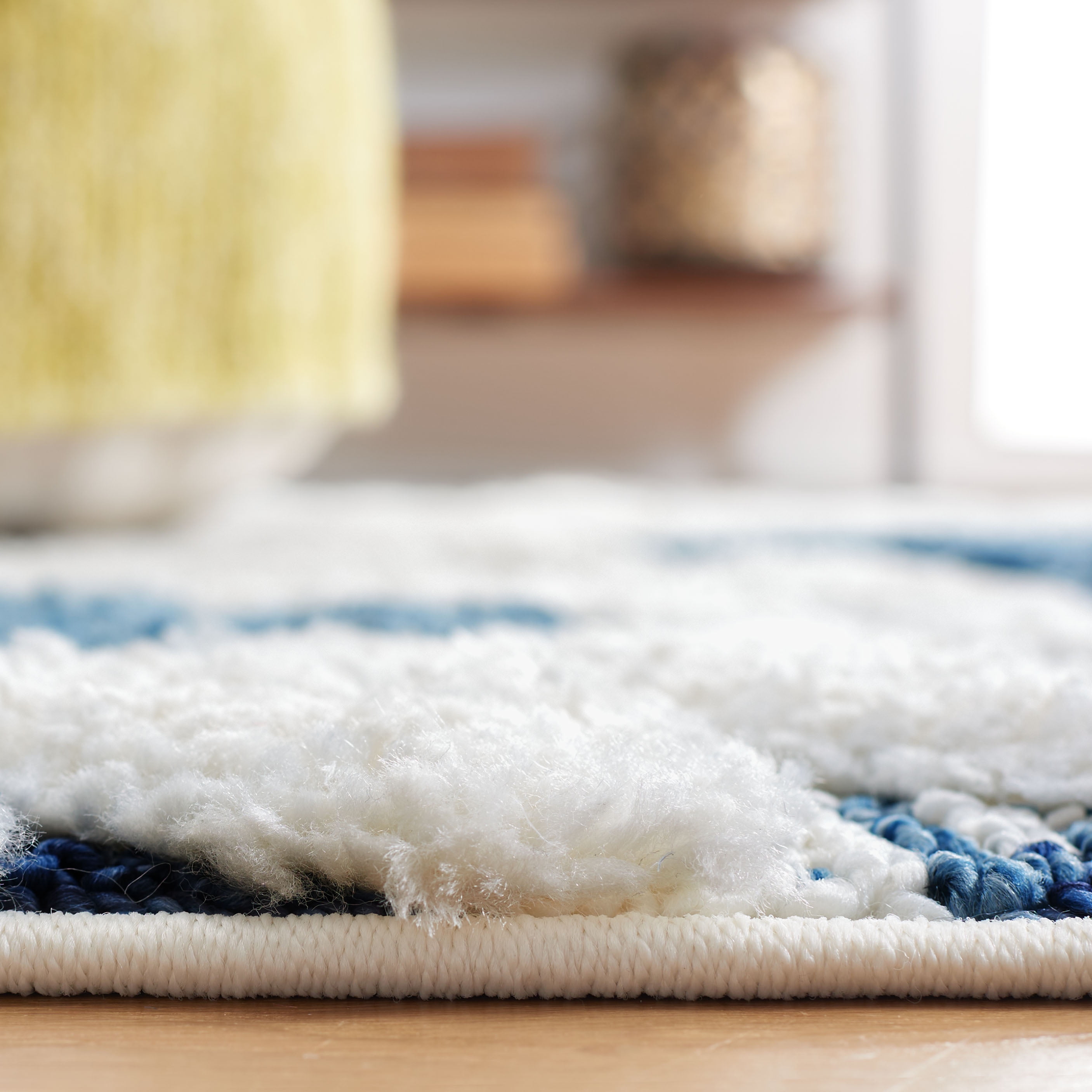 SAFAVIEH Moroccan Tassel Larry Geometric Shag Area Rug, Blue/Ivory, 8' x 10'