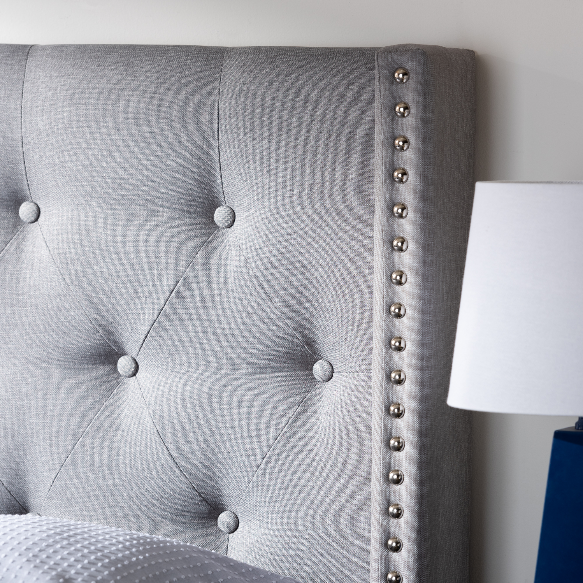 Bane Modern and Contemporary Light Grey Fabric Upholstered Queen Size Bed by Ember Interiors