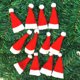 thumbnail image 5 of Worallymy 12 Uds. gorro de piruleta pequeño de Navidad gorros de Papá Noel no tejidos gorro de caramelo de piruleta decoración de fiesta de Navidad Worallymy JD735806584, 5 of 7
