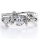 thumbnail image 1 of JeenMata Anillo de Bodas Solitario de Moissanita de Corte Redondo con Diseño de Enredadera de Hojas de 0,5 Quilates y 4 Puntas Engastado en Oro Blanco de 18 K sobre Plata, 1 of 10