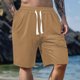 thumbnail image 1 of pstuiky Pantalones cortos de gimnasio para hombre, Pantalones cortos de trabajo de pierna recta, holgados y cómodos, de color liso, a la moda y para tiempo libre para hombre, 1 of 5