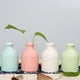 thumbnail image 5 of Jarrón pequeño de cerámica, florero creativo de escritorio, botella de aromaterapia sencilla y artesanal para decoración del hogar y la oficina (blanco), 5 of 7