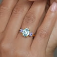 thumbnail image 4 of Gem Stone King 18K Yellow Gold Plated Silver Sky Blue Simulated Aquamarine and Blue Tanzanite 3 Stone Ring for Women (3.46 Cttw, Cushion Cut 10X8MM, Round 4.5MM, Gemstone, Size 9), 4 of 6