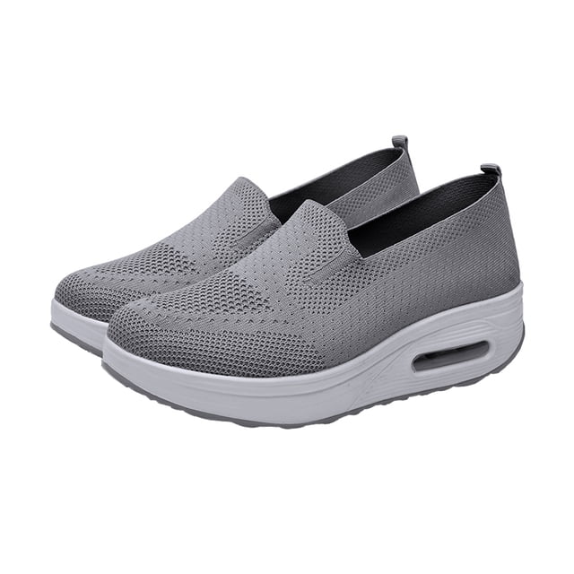 1 par de zapatillas deportivas de malla para mujer, transpirables y relajantes, con suela gruesa.