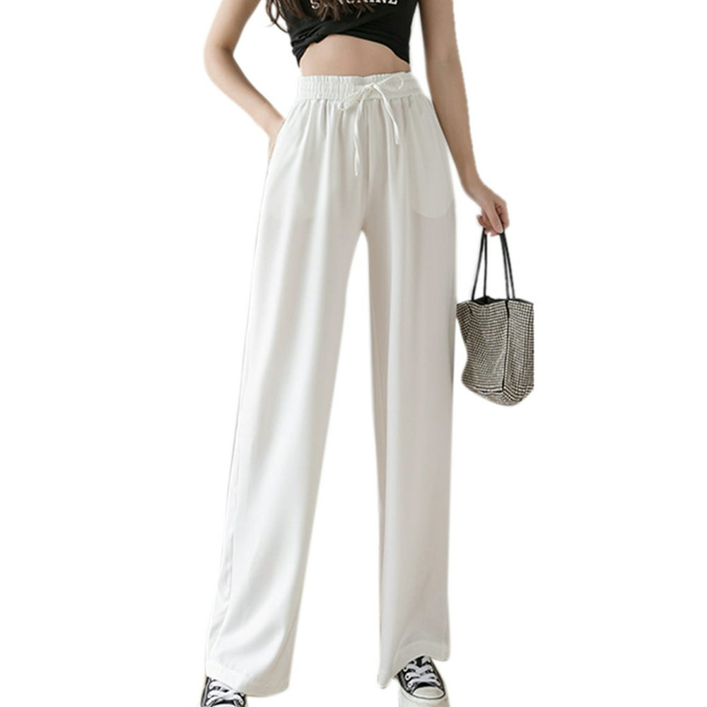 Wide-leg drawstring pants in mahogany brown color with front pleats and pocket detail