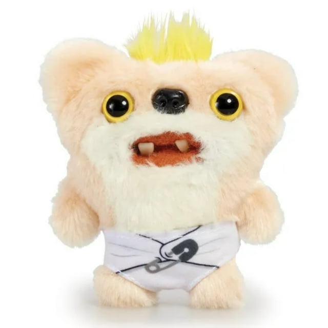 fugglers laboratory misfits - annoyed alien edition mini 4" plush toy funny ugly monster doll mutant figure plush toy gift for kids Un peluche frontal de 10 cm con silueta rechoncha y pelaje crema y durazno, mechón amarillo, orejas redondeadas, ojos negros con aro amarillo desiguales, pequeña nariz negra, boca naranja con dos dientes cortos y pañal blanco con dibujo de imperdible; a menudo se usa como peluche coleccionable o adorno de escritorio.