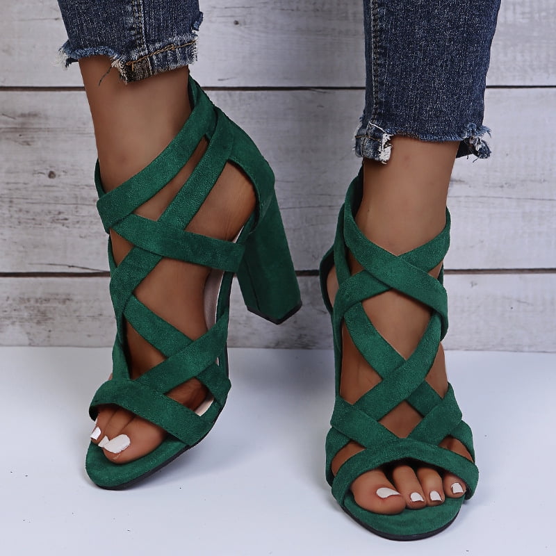 Green sandals with thin strap and jute interior and stiletto heel
