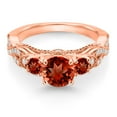thumbnail image 2 of Gem Stone King 18K Rose Gold Plated Silver Red Garnet and White Moissanite Engagement Ring for Women (1.57 Cttw, Gemstone January Birthstone, Round 6MM and 3MM, Size 5), 2 of 4