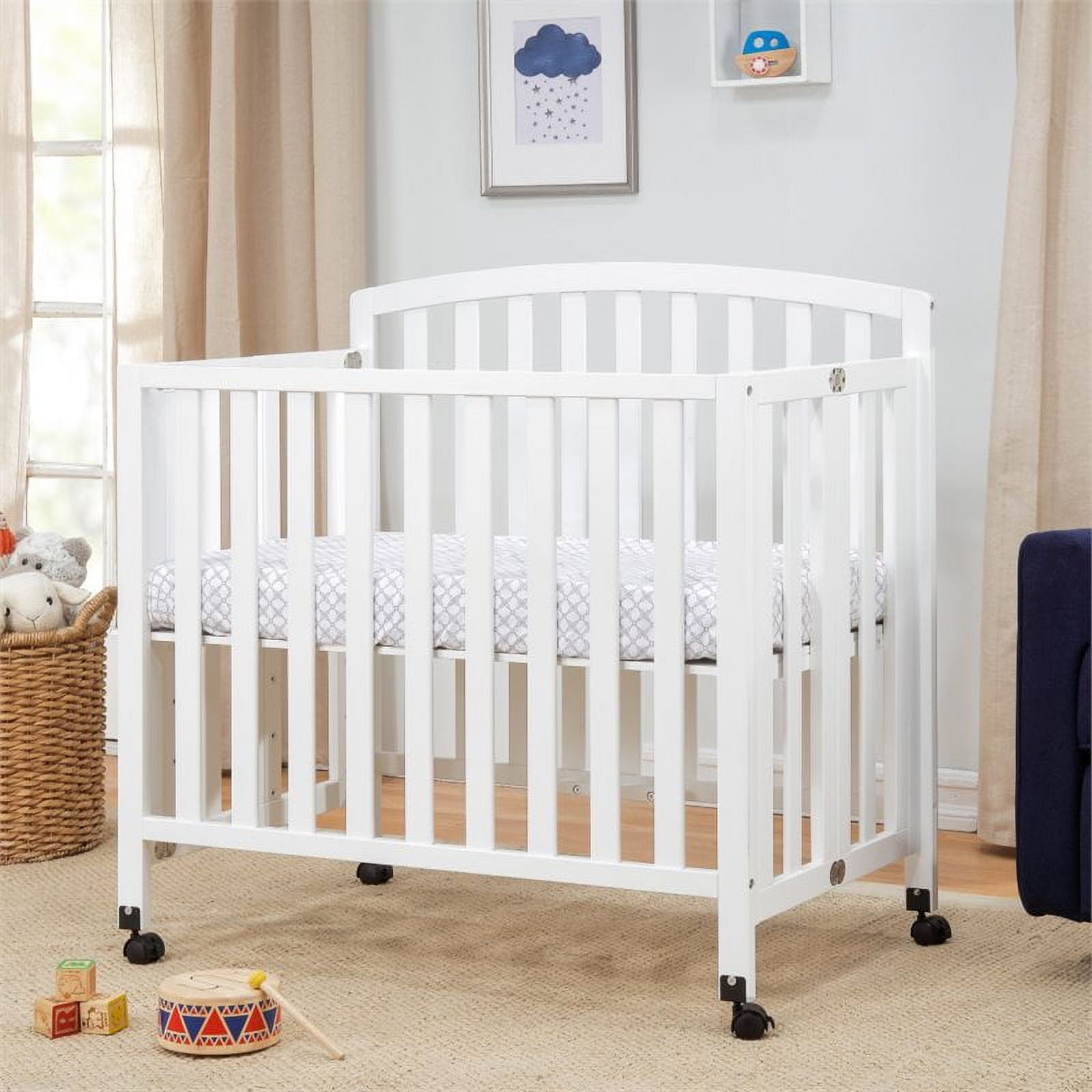 Davinci folding hotsell mini crib