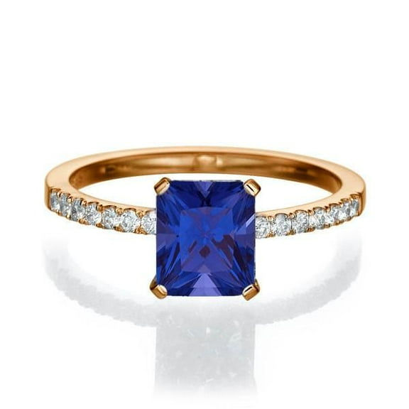 1.50 Carat 7x5mm Emerald Cut Blue Sapphire Engagement Ring in 10k Rose Gold