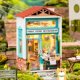 thumbnail image 2 of Casas de de as 3D Ciudad de Calle Miniatura Casas de Muñeca con Luces de Muebles Pntas Adornos de Juguete Educativo librería de Sunnimix Casa de muñecas en miniatura, 2 of 8