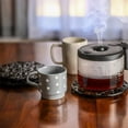 thumbnail image 7 of GIXUSIL Tea Pot Trivet for Kitchen, 4.7" Floral Pattern Hot Plate Pad for Party Sturdy Cast Iron Trivets Practical Kettle Trivet Holders for Table Dining Office, 2 Pcs/Black, 7 of 7