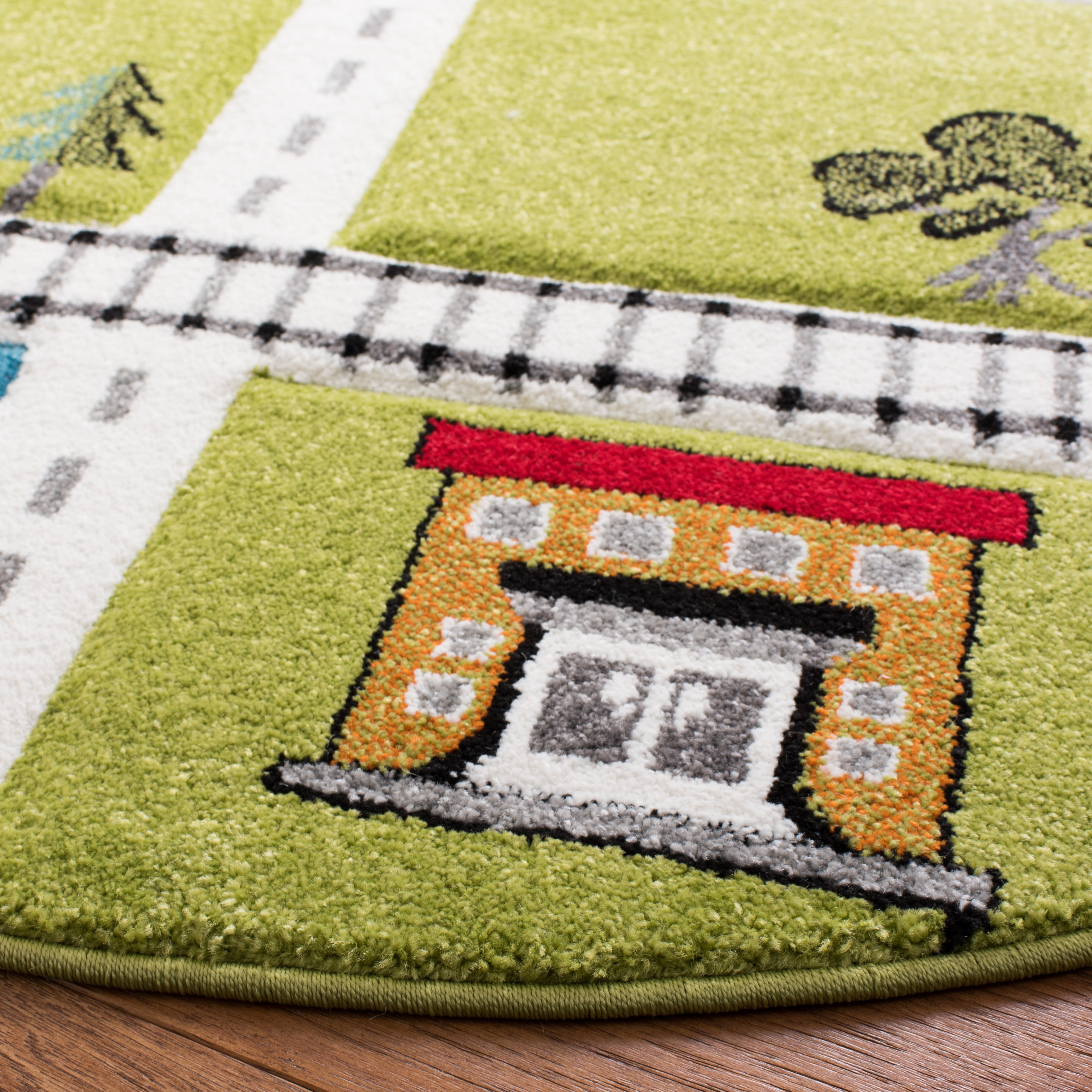 SAFAVIEH Carousel Kids Devan Train Track Area Rug, Green/Ivory, 8' x 8' Round