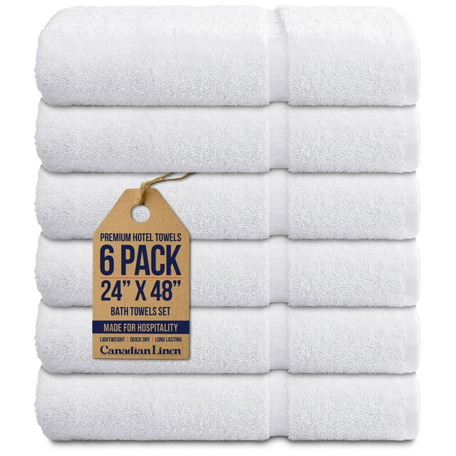 Canadian Linen Premium White Hotel Medium Bath Towels, 24”x48”, 6 Pack stacked neatly. These lightweight, soft, absorbent, and quick-drying towels are made from a durable poly-cotton blend, ideal for bathroom, spa, gym, pool, and travel use, offering institutional strength and hospitality-grade quality.