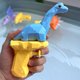 thumbnail image 1 of Pistola de agua para niños 4PCS Juguetes de piscina Juguetes de agua de verano Pistolas de chorro de dinosaurios Juguetes para niños al aire libre Piscina Juegos de playa Patio trasero Jugue, 1 of 4
