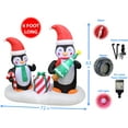thumbnail image 2 of 6 Foot Long Christmas Inflatable TwoHappy Penguins Holding Christmas Tree, Gift Box & Candy Cane LED Lights Decor Outdoor Indoor Holiday Decorations, Blow up Lighted Yard Decor, Home Lawn Inflatables, 2 of 4
