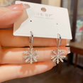 thumbnail image 4 of Cubic Ziconia Snowflake Dangle Hoop Earrings for Women Sparkling Crystal Winter Flower Dangling Charm Huggie Hoops Statement Earrings for Christmas, 4 of 9