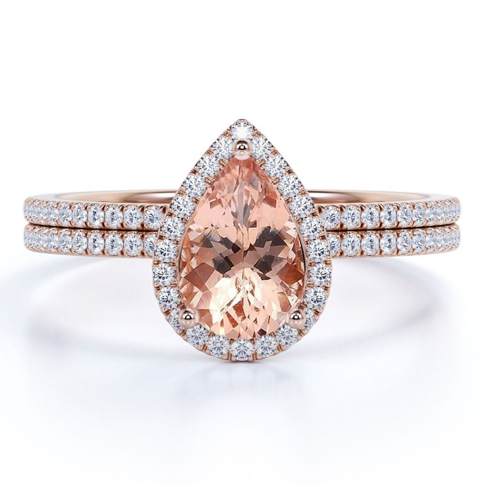 JeenMata Art Deco 1.5 Carat Pear cut created morganite and Moissanite Bridal Wedding Ring Set with Engagement Ring and Wedding Band in 18k Gold Over Silver