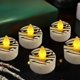 thumbnail image 4 of Paquete de 12 velas LED de té para Halloween | Faroles fantasma de calabaza sin llama con temporizador | Decoraciones seguras a pilas para la mesa y el hogar, 4 of 6