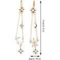 thumbnail image 4 of Pendientes largos con colgante de luna y estrella dorada, 4 of 4