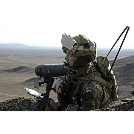 November 1 2013 - Airman watches simulated enemy targets at an observation point at the Orchard Training Combat Center near Boise Idaho Poster