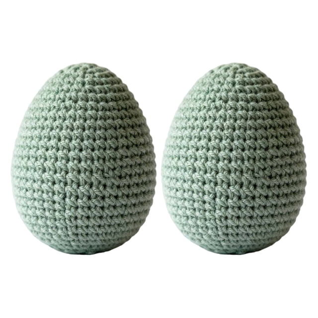 Tejido a mano, elaborado meticulosamente: cada huevo de Pascua está tejido a mano, con delicadas puntadas que proporcionan un tacto suave y cómodo, añadiendo calidez y encanto a la decoración.