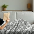 thumbnail image 3 of Grey and White Soft Flannel Fleece Throw Blanket, Swirling Leaves Flower Petals with an Abstract Design, Cozy Plush for Indoor and Outdoor Use, 70" x 90", Charcoal Grey and White, by Ambesonne, 3 of 5