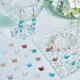 thumbnail image 4 of 1 caja de 150 cuentas espaciadoras de mariposa de 10 mm, cuentas de vidrio de mariposa galvanizadas, lámina dorada, transparente, sueltas, coloridas, abalorios de mariposa a granel, 4 of 6