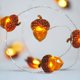 thumbnail image 4 of Guirnalda de luces colgantes navideñas con control remoto | 20 bombillas LED naranjas | Decoración de interiores a pilas de 2 metros para un ambiente festivo, 4 of 8