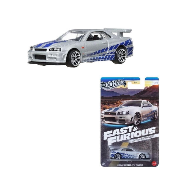 Vehículo de Colección Hot Wheels Collector Fast & Furious Nissan Skyline a escala 1:64, réplica plateada con franjas azules y neumáticos detallados, en empaque especial Fast & Furious, ideal para coleccionistas y exhibición de autos de juguete.
