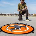 thumbnail image 1 of Drone Landing Pad 75cm Landing Pad for Drones Indoostrial Foldable Landing Track Waterproof Foldable Landing Mat Takeoff Landing Helipad Pad for DJI Mavic 2, 1 of 5