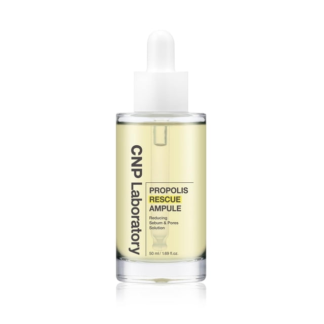 sérum cnp rescue+propolis con niacinamida e ip-bha 30 ml frasco transparente con pipeta blanca, vista frontal centrada; líquido amarillo pálido, etiqueta vertical 'CNP Laboratory' y recuadro amarillo 'Propolis Rescue Ampule', suero calmante e hidratante para poros y manchas, sobre fondo blanco.