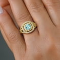thumbnail image 4 of Gem Stone King 18K Yellow Gold Plated Silver Sky Blue Topaz and White Moissanite Ring for Women (2.01 Cttw, Gemstone Birthstone, Cushion/Checkerboard Cut 6MM, Available in Size 5, 6, 7, 8, 9), 4 of 4