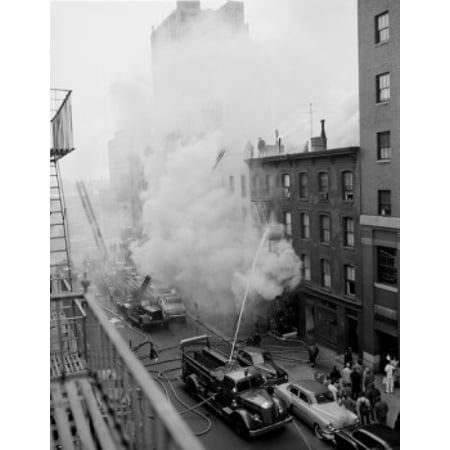 47th Street Photo - USA New York State New York City Fire on East 47th Street with fire engines shooting water on burning building Canvas Art - (18 x 24)