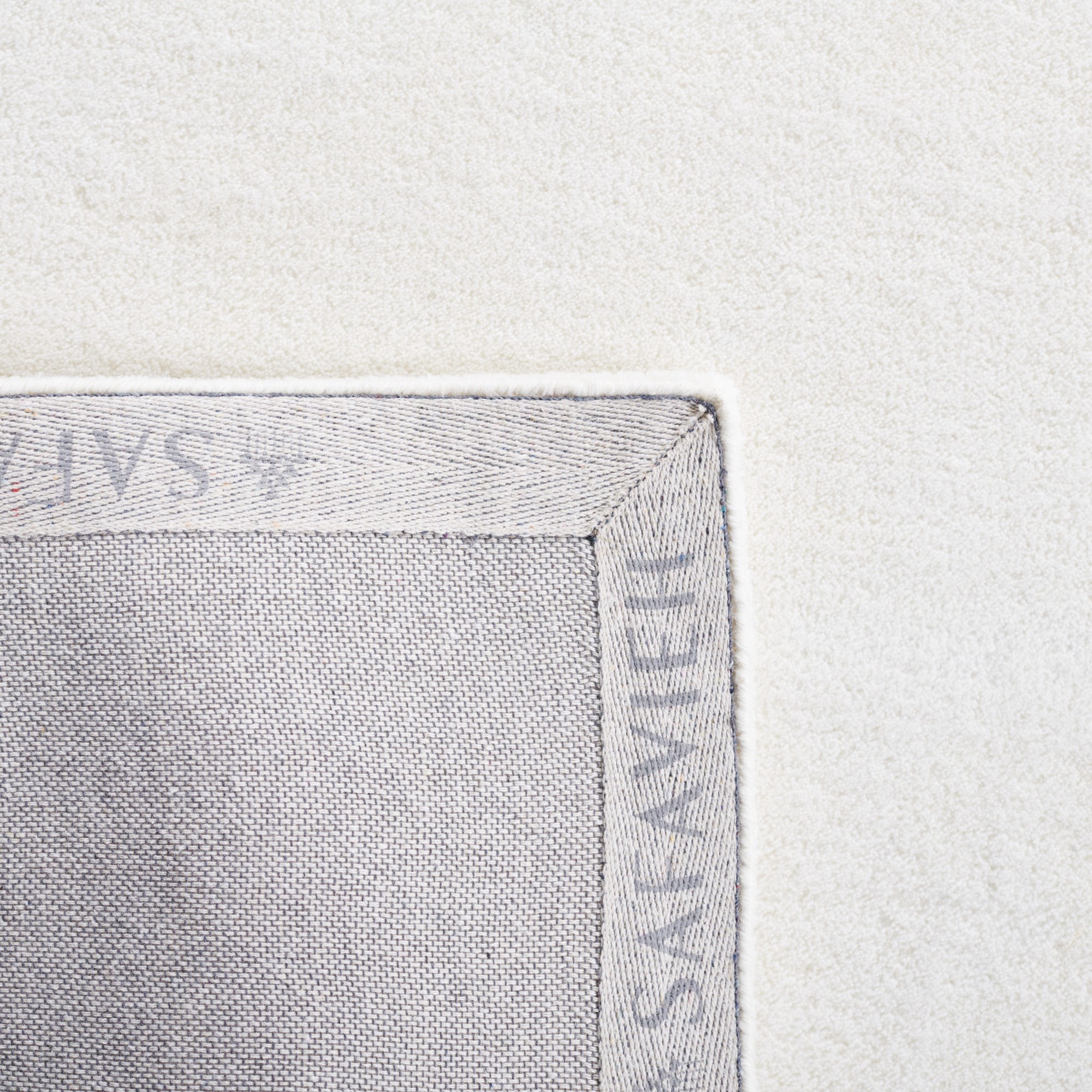 SAFAVIEH Fifth Avenue Debra Solid Area Rug, Ivory, 3' x 5'