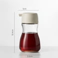 thumbnail image 1 of Botella dispensadora de aceite de sésamo de vidrio con control de volumen, perfecta for condimentar y cocinar, 1 of 2