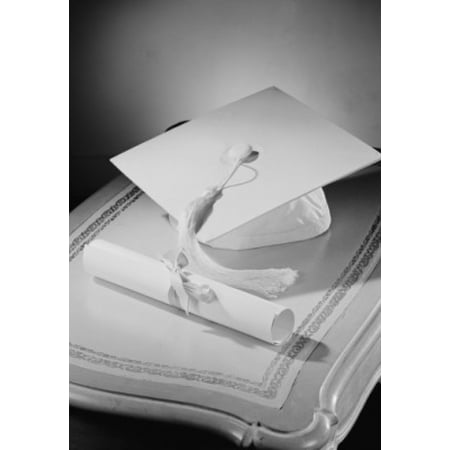 Graduation diploma and mortar board on bedside table Canvas Art -  (18 x