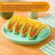thumbnail image 3 of Juego de 2 platos de silicona para tacos, ideales para cenas y fiestas familiares sin complicaciones. Bandeja apta para microondas y horno. Capacidad para 4 tacos cada una., 3 of 5