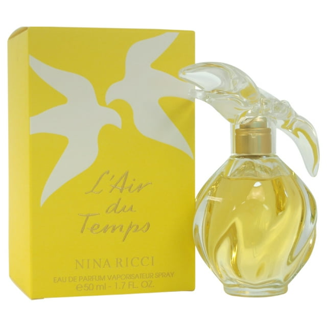 L'air du Temps by Nina Ricci for Women - 1.7 oz EDP Spray. A floral perfume with notes of bergamot, rosewood, rose, jasmine, violet, iris, cedar, sandalwood, musk, and amber. The bottle features a dove-shaped cap and is paired with a yellow box adorned with white dove designs.