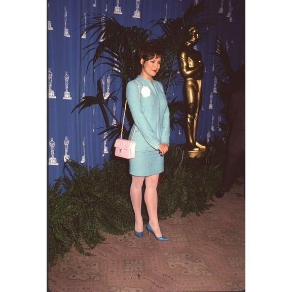 Jennifer Tilly In Light Blue Skirt Suit And White Tights At Academy Nominee Lunch Photo Print (8 x 10) - Item # CPA2604