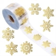 thumbnail image 1 of Rollo de 2500 Pegatinas Navideñas de Copos de Nieve Dorados - Etiquetas Adhesivas Redondas Transparentes para Decoración Navideña, 1 of 5