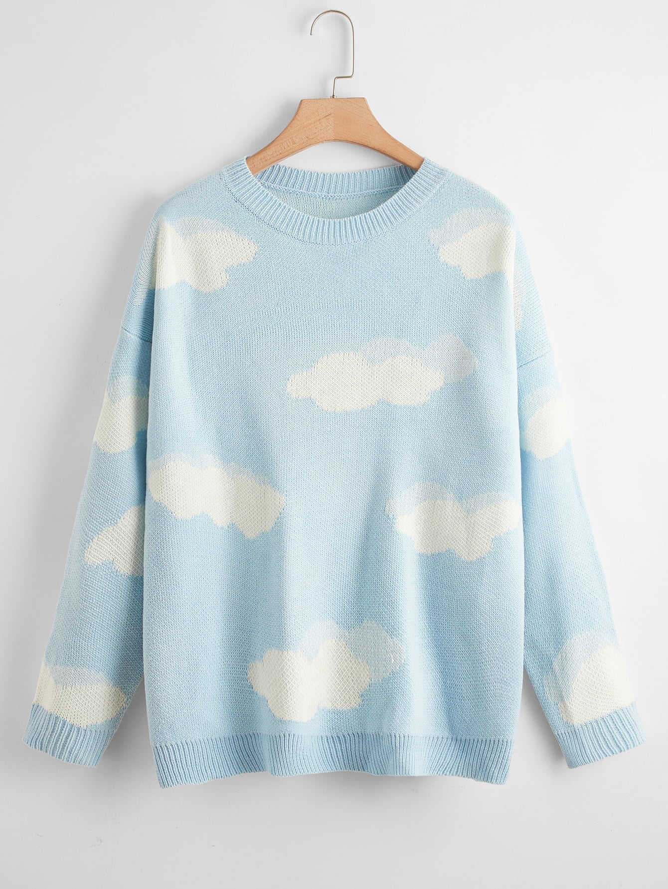 light blue sweater with clouds