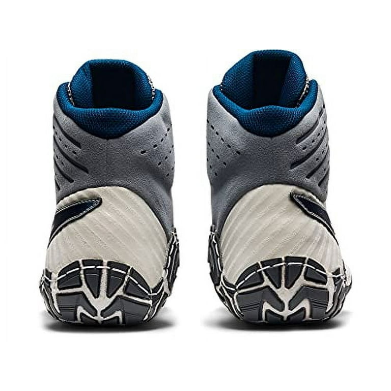 Aggressor 1 deals wrestling shoes