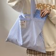 thumbnail image 4 of Bolso de mano para mujer, novedad de primavera y verano de 2024, bolso de hombro de gran capacidad, bolso con letras a rayas, bolsos universitarios, bolsos de compras para mujer, 4 of 5