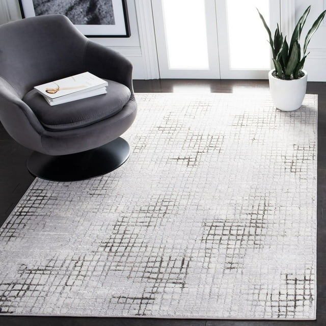 SAFAVIEH Orchard Eilish contemporary abstract area rug featuring a light gray background with subtle dark grid patterns, shown in a modern living space with dark flooring, an upholstered swivel chair, and potted plant.