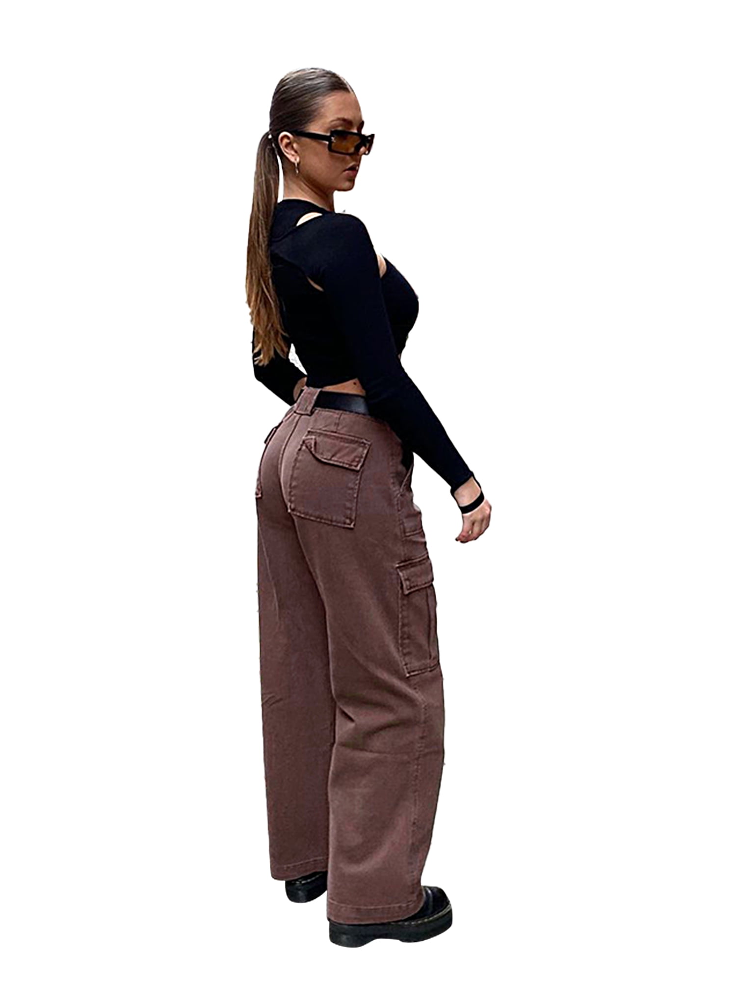 Woman in black brassiere and brown pants standing on road during daytime  photo  Free Apparel Image on Unsplash
