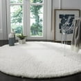 thumbnail image 2 of SAFAVIEH Sybella Solid Plush Polyester Sheep Shag Area Rug, Ivory, 8' x 10', 2 of 10