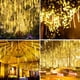 thumbnail image 2 of Luces de lluvia de meteoritos solares FloreceBien, 30 cm, 8 tubos, 144 LED, luces de meteorito azules, cadena de luces LED con forma de lluvia que cae para decoración de fiestas navideñas, patios y, 2 of 8